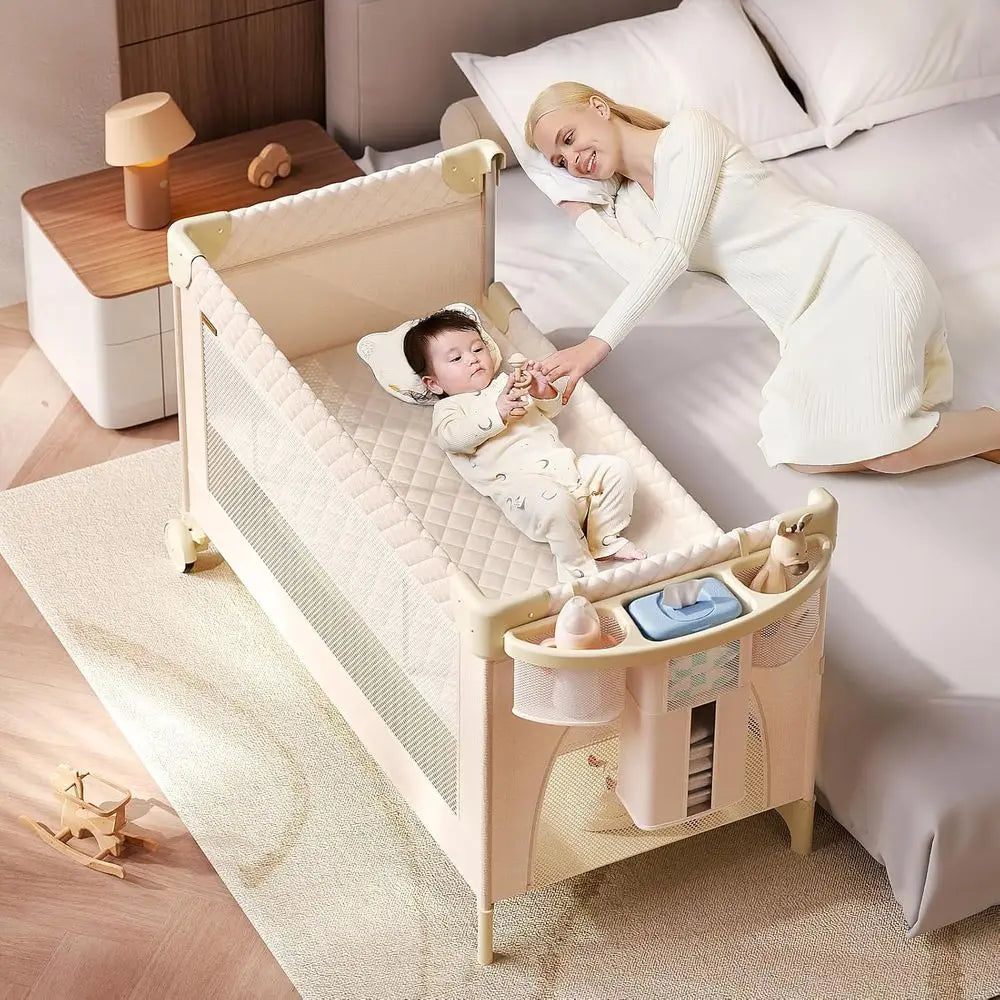 All-in-One Baby Bassinet, Play and Sleep Station, Bedside Crib with Diaper Changer, Storage, and Toy Bar for Newborns to Toddler