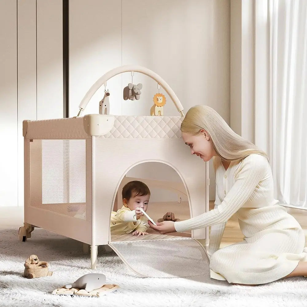 All-in-One Baby Bassinet, Play and Sleep Station, Bedside Crib with Diaper Changer, Storage, and Toy Bar for Newborns to Toddler