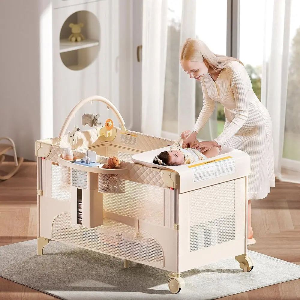 All-in-One Baby Bassinet, Play and Sleep Station, Bedside Crib with Diaper Changer, Storage, and Toy Bar for Newborns to Toddler